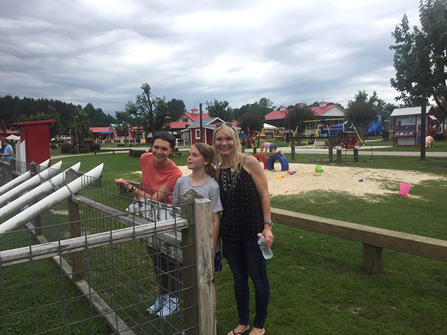 Mother and children attending the Family Fun Day in Youngsville